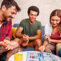 Friends playing a board game, representing a turning point in our product